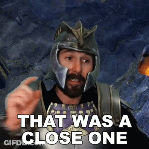 Man In Helmet And Armor Says That Was A Close One GIF