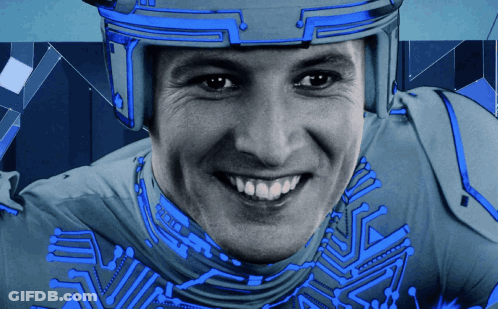 Man In Helmet And Blue Shirt Smiling GIF