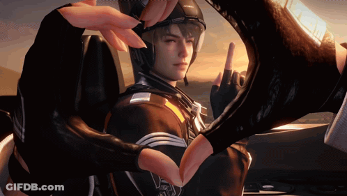 Man In Helmet And Gloves Making Heart Shape With Hands GIF