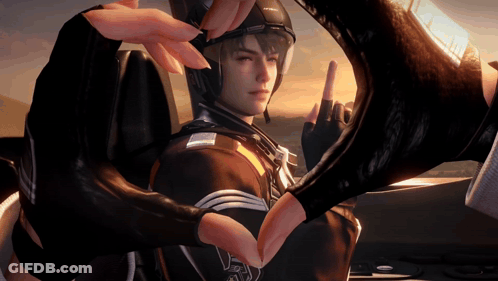 Man In Helmet And Gloves Making Heart Shape With Hands GIF