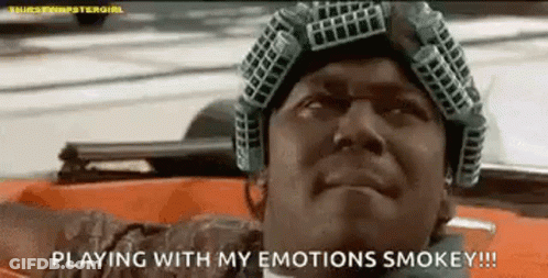 Man In Helmet And Goggles Playing With Emotions In Car GIF