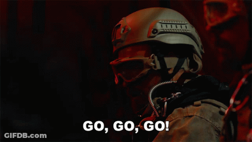 Man In Helmet And Goggles Saying Go Go Go GIF