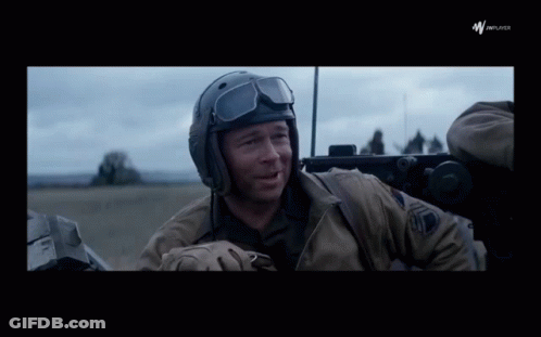Man In Helmet And Goggles Sitting In Vehicle Warplayer GIF