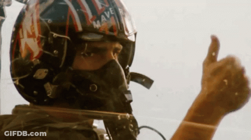 Man In Helmet And Mask Giving Thumbs Up GIF