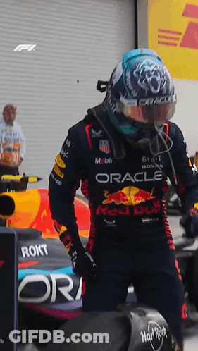 Man In Helmet And Red Bull Shirt GIF