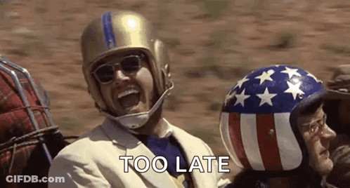 Man In Helmet And Sunglasses Sitting In Car GIF