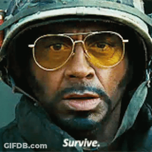 Man In Helmet And Sunglasses Survive GIF