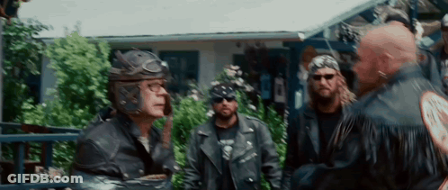 Man In Helmet And Sunglasses Talking To Another Man GIF