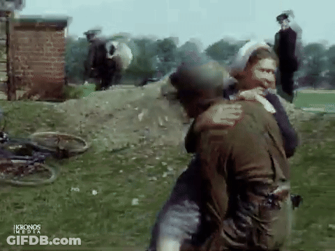 Man In Helmet Carrying Woman GIF