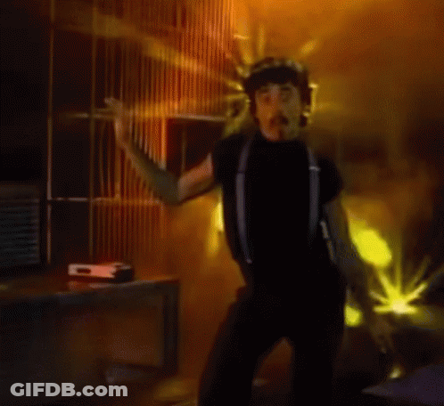 Man In Helmet Dancing At Microphone GIF