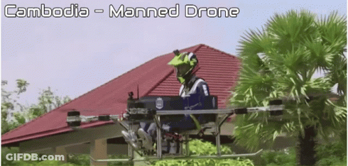 Man In Helmet Flying Manned Drone In Cambodia GIF