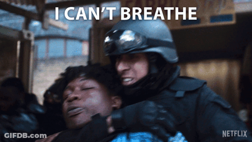 Man In Helmet Holding Another Man Breathe GIF