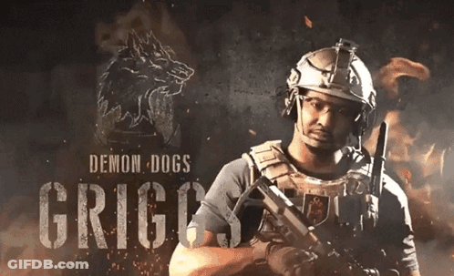 Man In Helmet Holding Gun Demon Dogs GIF