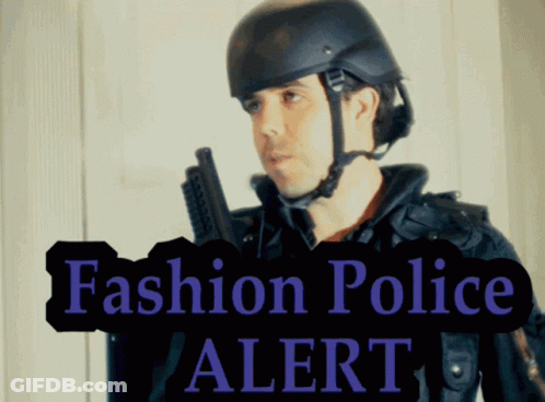 Man In Helmet Holding Gun With Fashion Police Alert GIF