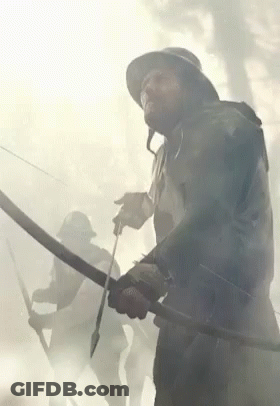 Man In Helmet Holding Sword GIF