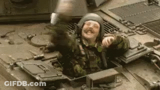 Man In Helmet In Military Vehicle GIF