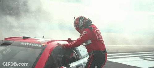 Man In Helmet Next To Red Race Car Saying Briscoe GIF