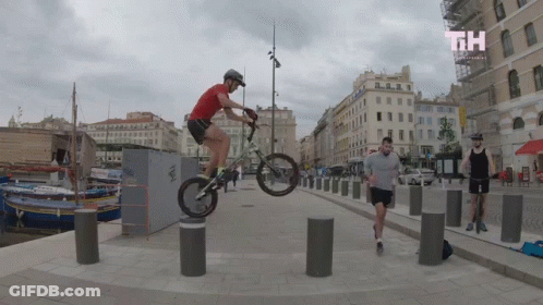 Man In Helmet Riding Mobility Scooter GIF