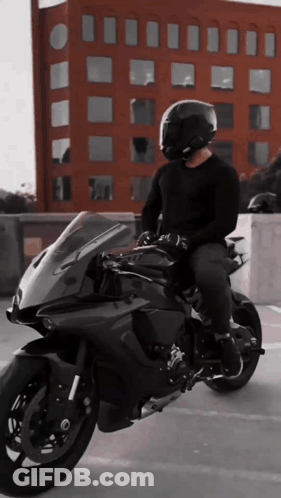 Man In Helmet Riding Motorcycle GIF
