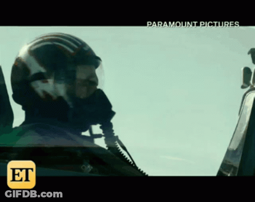 Man In Helmet Sitting In Paramount Picture GIF