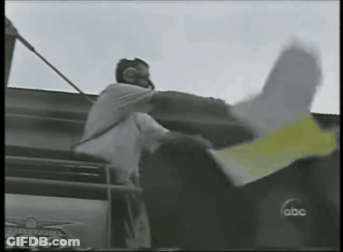 Man In Helmet Standing On ABC Plane GIF