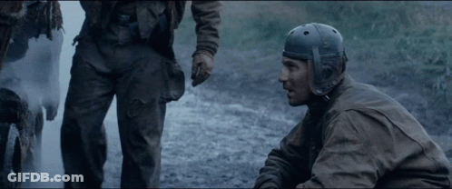 Man In Helmet Talking To Another Man In Field GIF