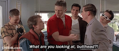Man In Helmet Talking To Man Saying Are You In Or Out GIF