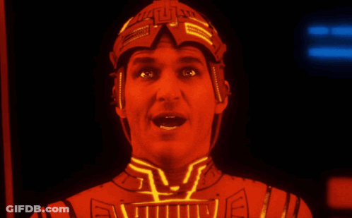 Man In Helmet With Letter L Looking At Camera GIF