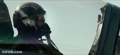 Man In Helmet With T In Cockpit GIF