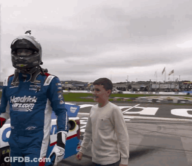 Man In Hendrick Cars.com Uniform Walking With Boy GIF