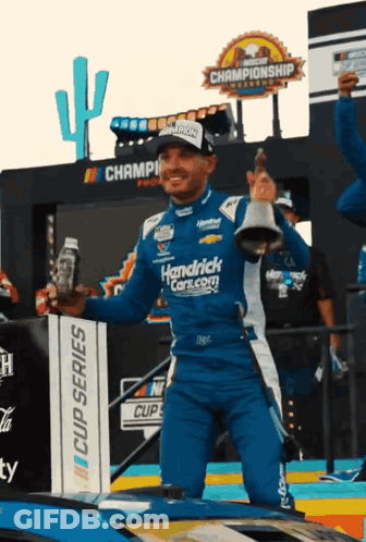 Man In Hendrick's Car Holding Bell GIF