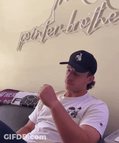 Man In Herbalife Jersey Holding Football GIF