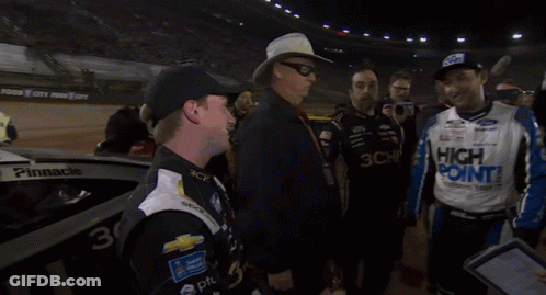 Man In High Point Jacket Shaking Hands With Cowboy Hat GIF