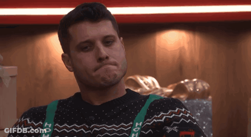 Man In Ho Ho Sweater And Suspenders GIF