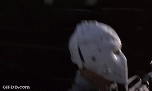 Man In Hockey Helmet Standing By Car GIF