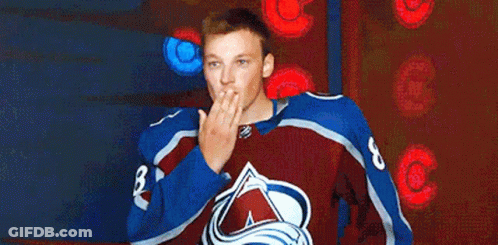 Man In Hockey Jersey Blowing Kiss GIF