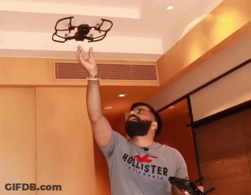 Man In Hollister Shirt Throws Drone GIF