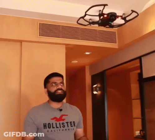 Man In Hollister T-Shirt In Front Of Drone GIF