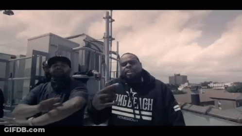 Man In Homegrown Hoodie Standing Next To Another Man GIF