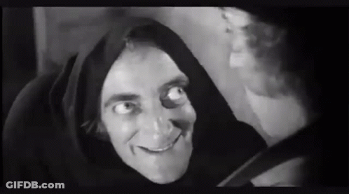 Man In Hood Smiling Black And White GIF