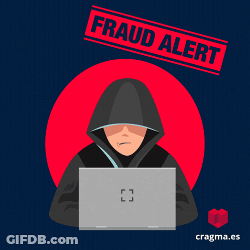 Man In Hood Using Laptop With Fraud Alert Stamp GIF