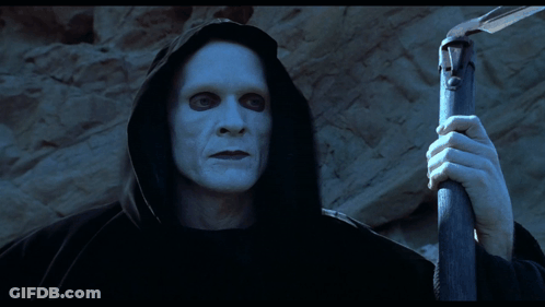 Man In Hooded Cape Holding Stick Saying No One Has GIF