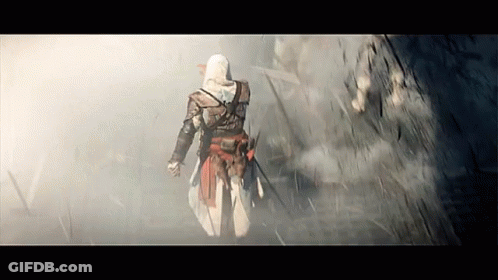 Man In Hooded Cloak Walking In Fog GIF