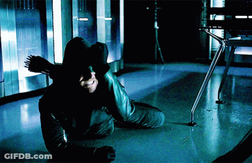Man In Hooded Jacket Kneeling GIF