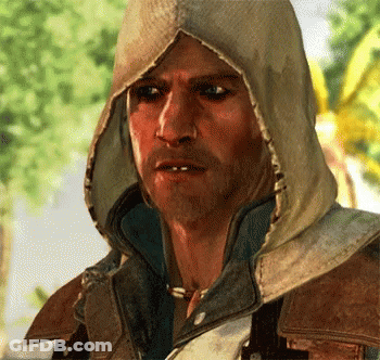 Man In Hooded Jacket Looking At Camera GIF