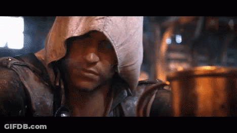 Man In Hooded Jacket Looking At Camera GIF