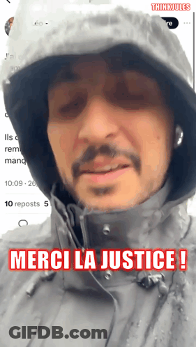 Man In Hooded Jacket Merci La Justice GIF