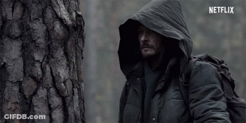 Man In Hooded Jacket Next To Tree With Netflix GIF