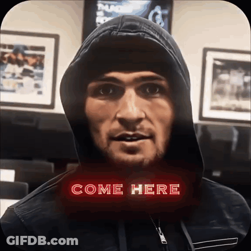 Man In Hooded Jacket Saying Come Here GIF