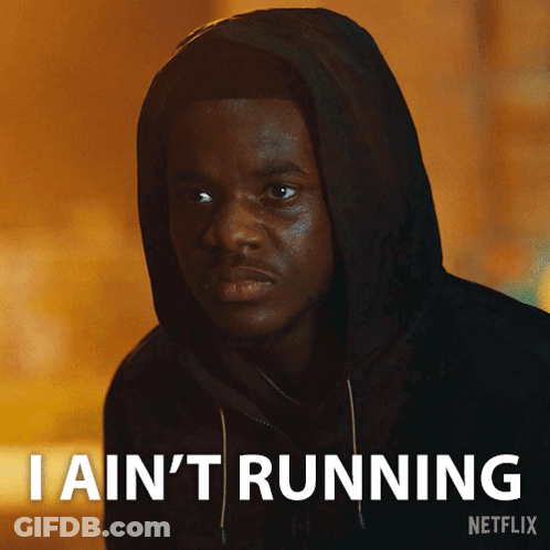 Man In Hooded Jacket Says I Ain't Running GIF